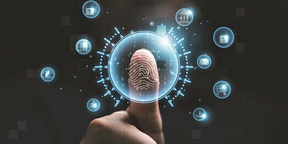 Man using thumb to scan finger print or for digital processing  biometric identification  to access  security system includes internet banking, cloud system and mobile phone , Cyber security concept.
